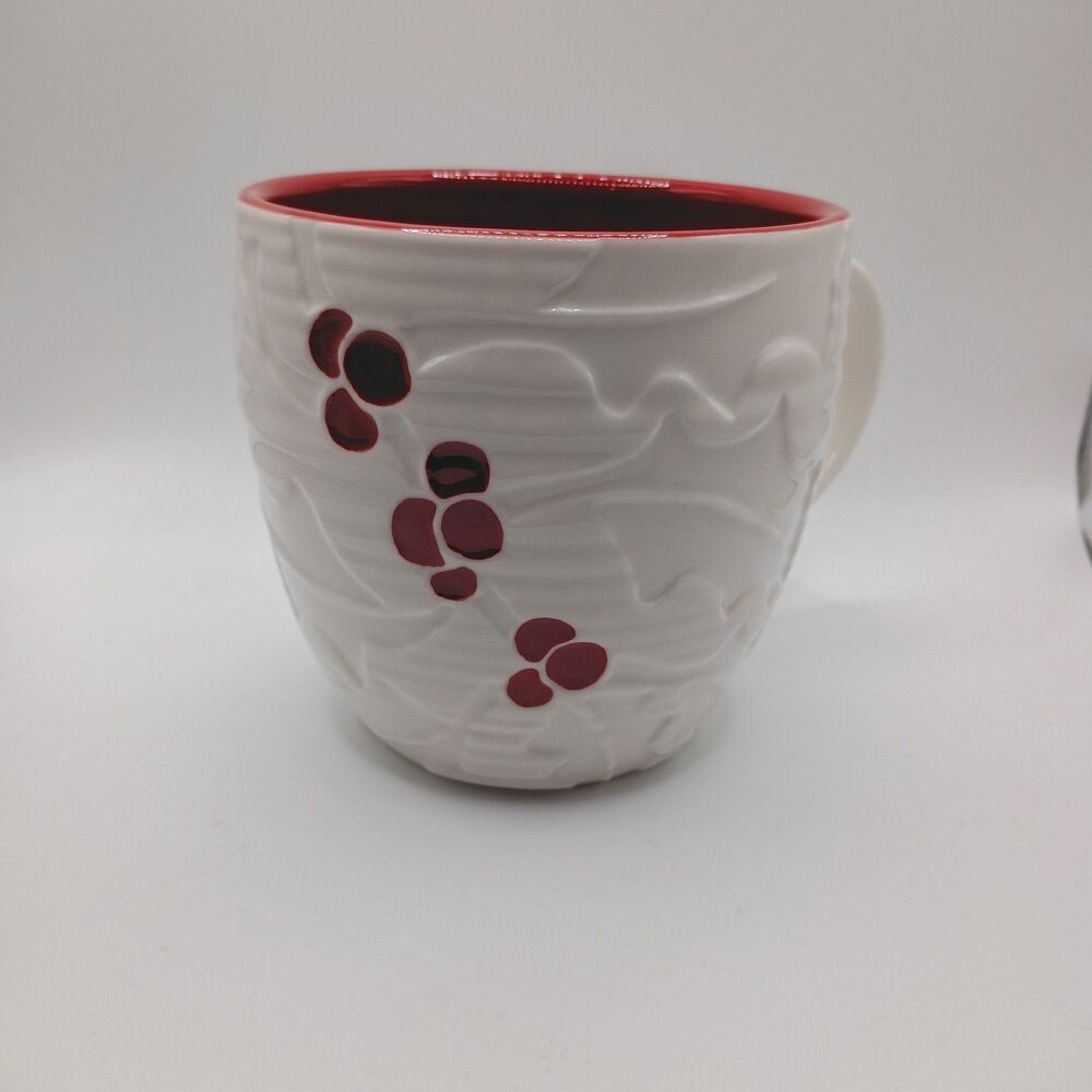 Starbucks 2010 hand painted holly leaf mug